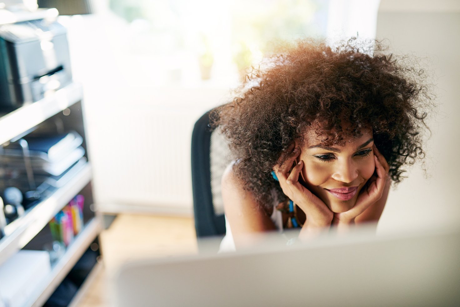 Young Black Girl Looking at Screen